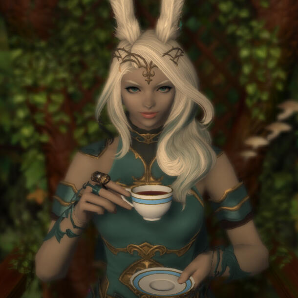 A viera glancing at the camera while drinking a cup of tea